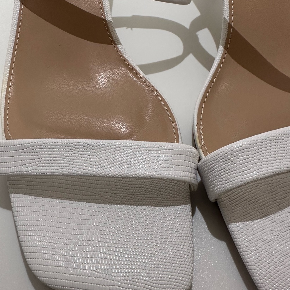 Brand new white, strappy, ladies 2inch heels.